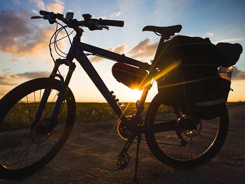 silhouette-of-a-bike-on-sunset-2021-08-31-23-25-41-utc_min