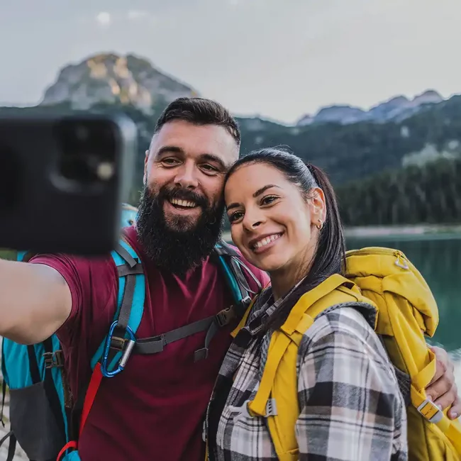 smiling-couple-taking-a-selfie